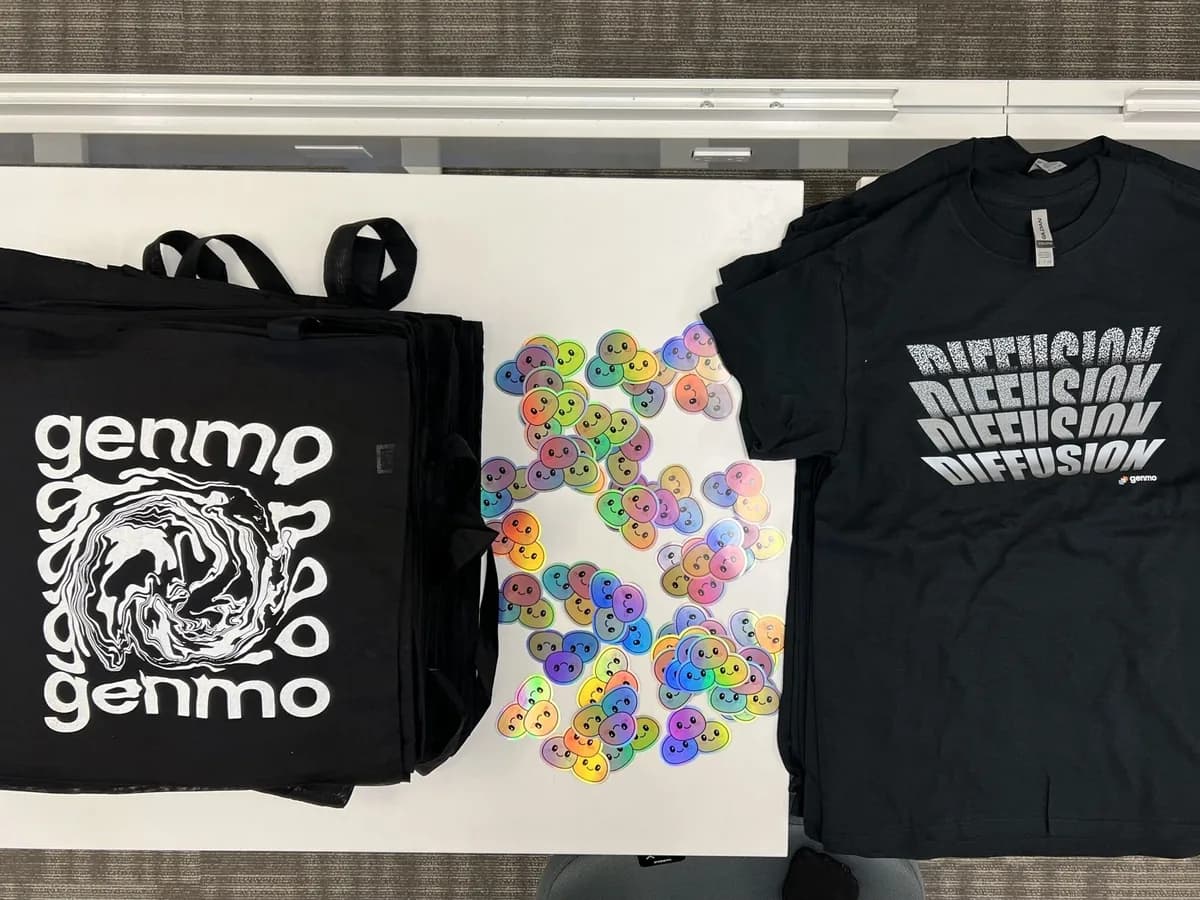 Genmo tote bags, T-shirts, and colorful stickers