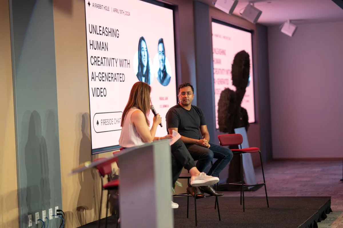 A conversation about AI research on stage